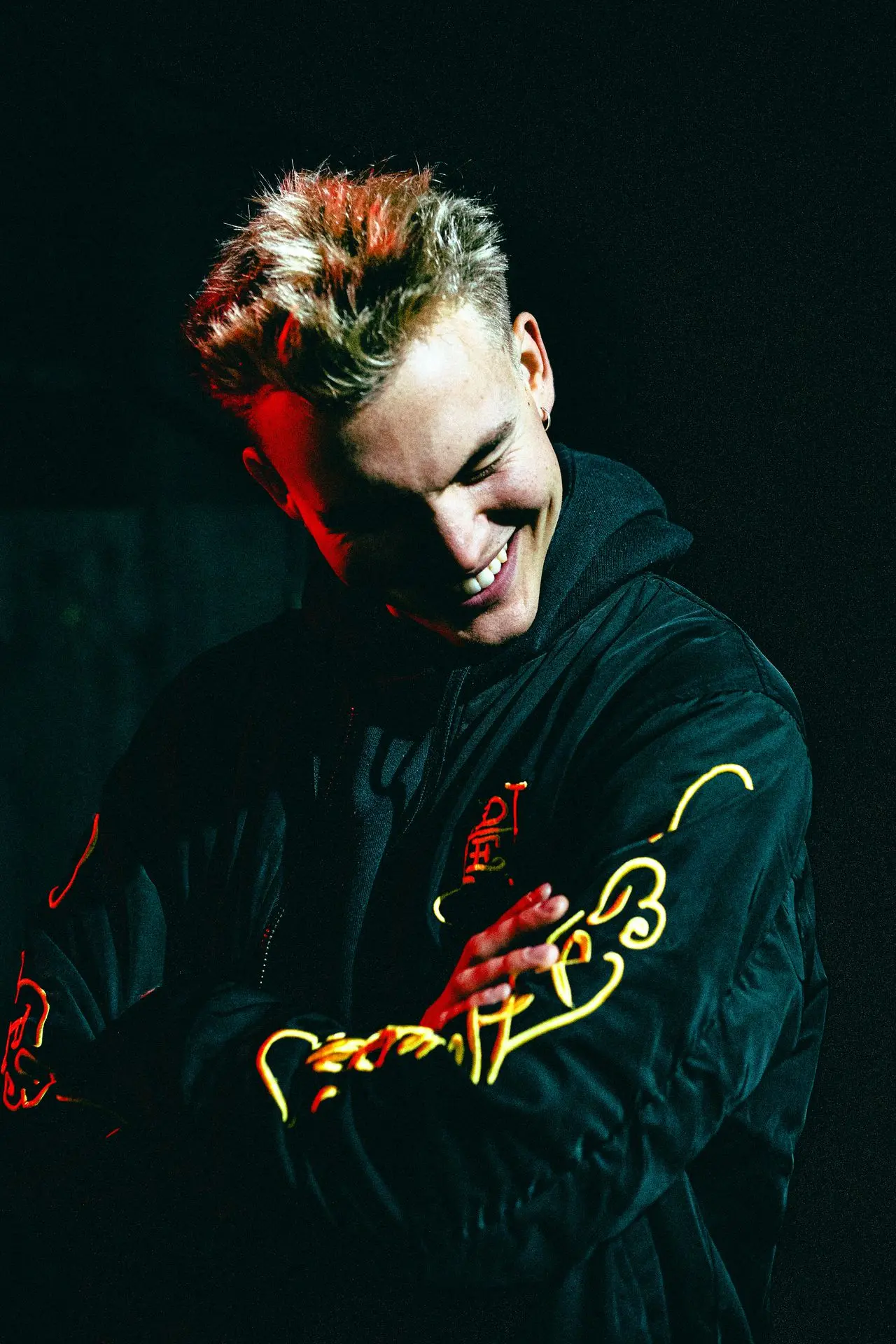 Ferdinand McKay K Neil music performance under red stage light