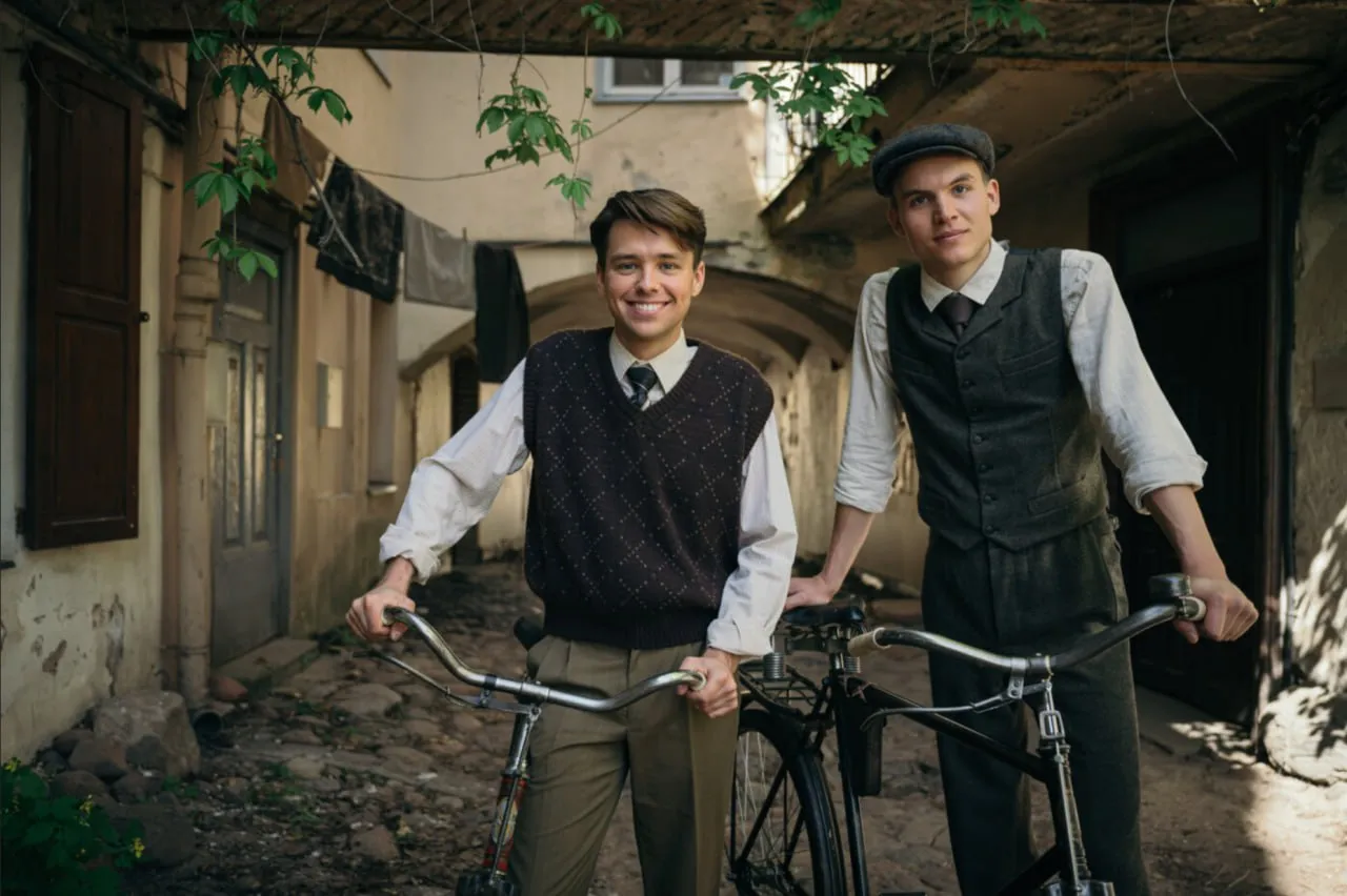 Ferdinand McKay in Truth and Treason period costume with bicycles
