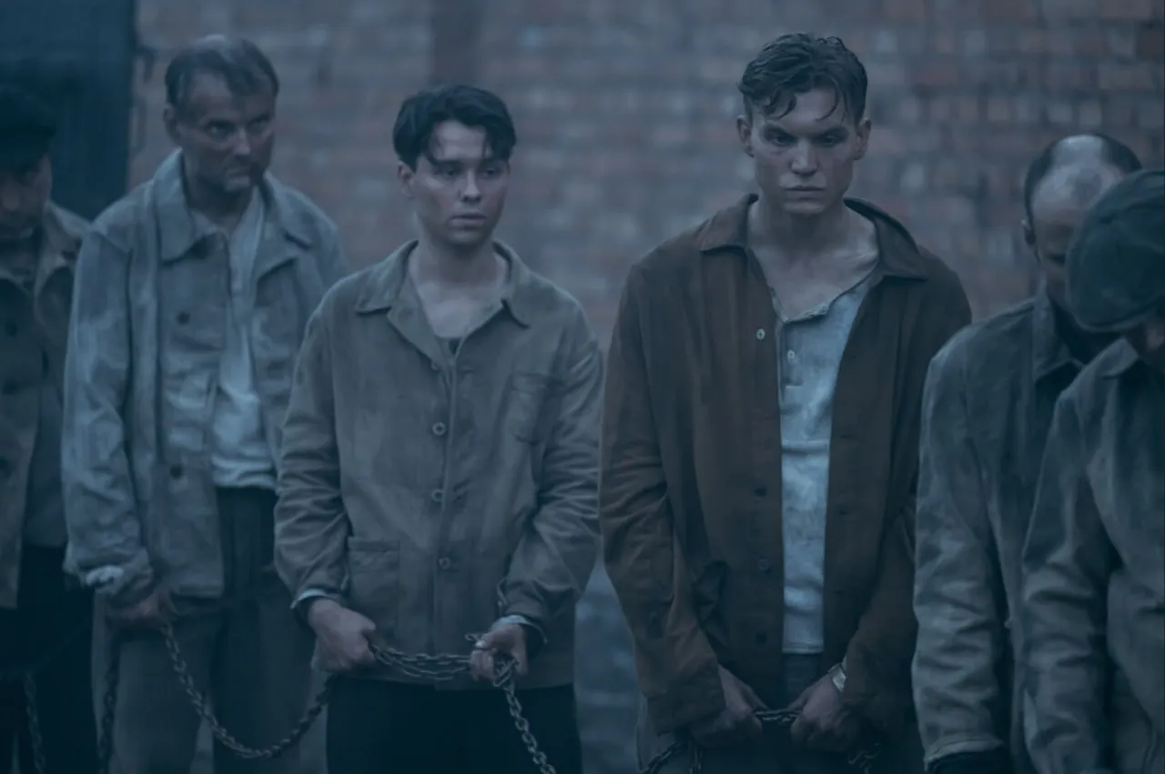 Ferdinand McKay in Truth and Treason prison scene in chains